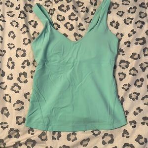 LULULEMON waist length align tank top. teal color. size 2. built in bra.